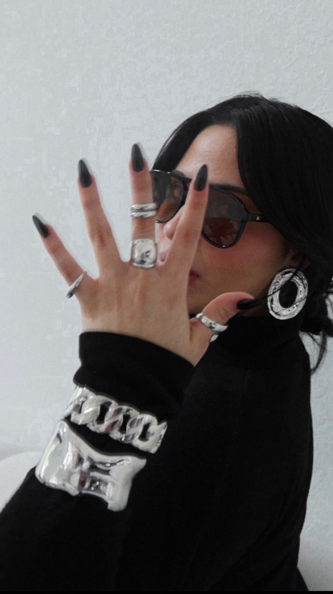 LOOPED IN STATEMENT EARRINGS