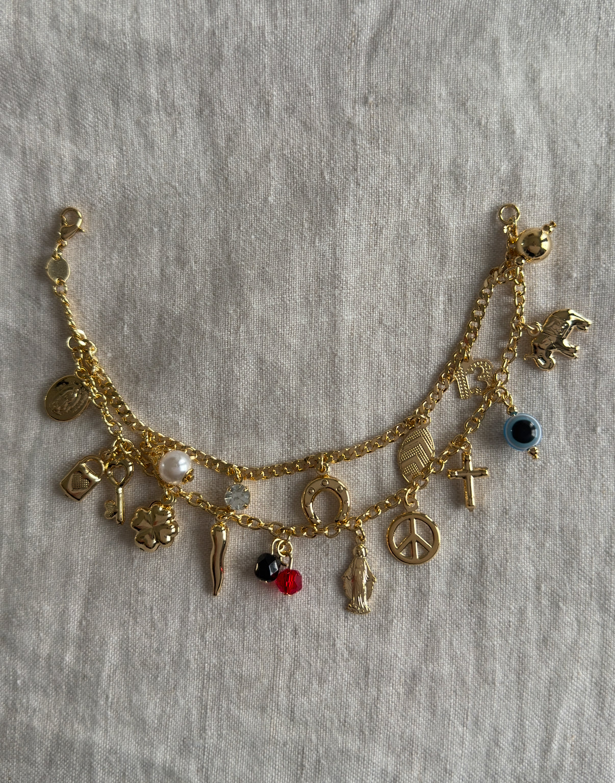 SHES SO LUCKY CHARM BRACELET